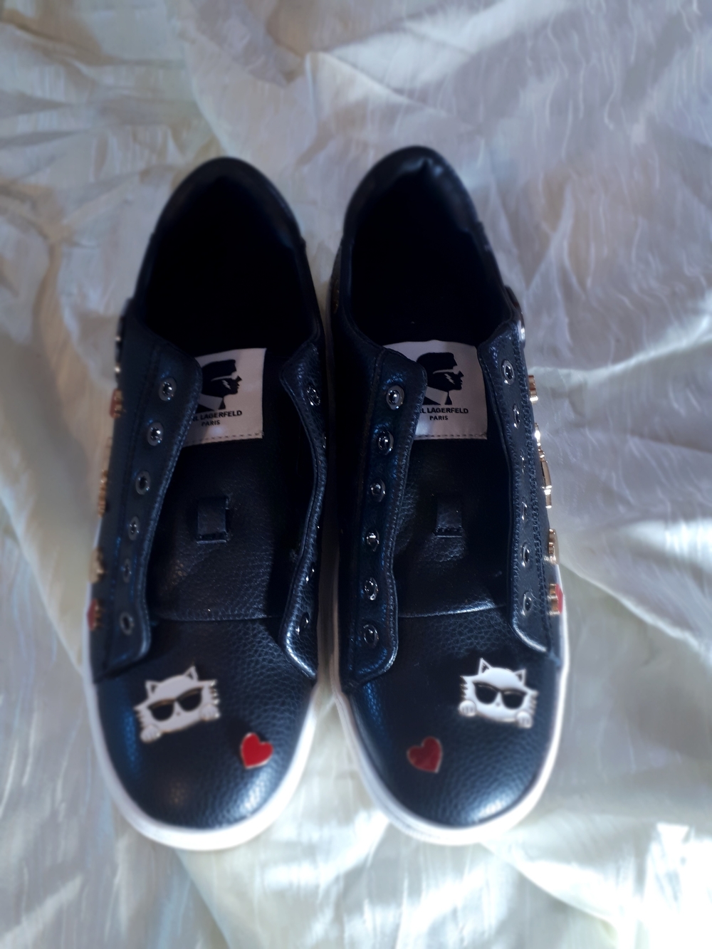 (Karl Lagerfeld Black Slip-On Sneakers) with White Cat and Red Heart Accents